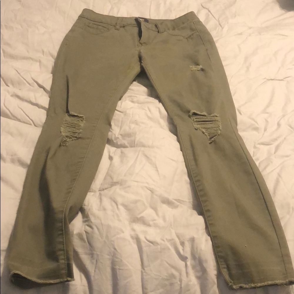 Green distressed jeans